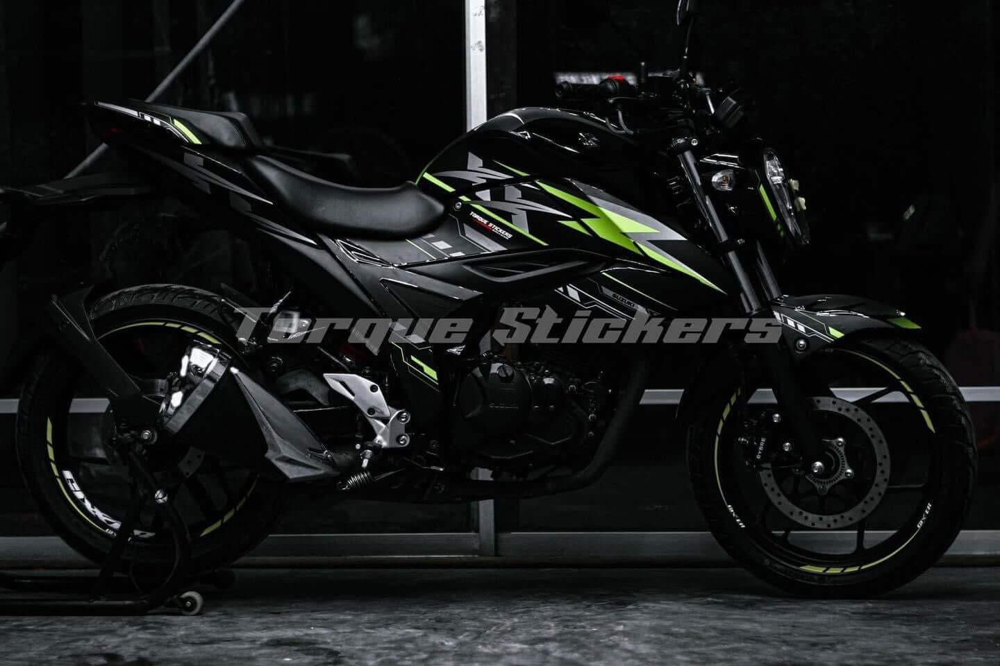 Gixxer FI XX motorcycle with the newly applied Decal Set, showcasing sleek and vibrant graphics.
