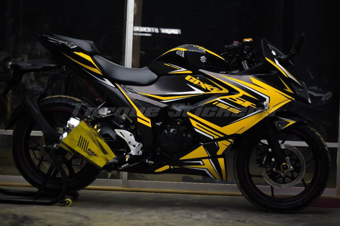 Gixxer SF Sporty Decal shown on a black motorcycle with vibrant yellow accents, highlighting the dynamic design and sporty style.